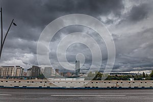 Panorama of the skyline of Belgrade, over the sava river in a cloudy sky with Belgrade waterfront, or Beograd na vodi, behind. It