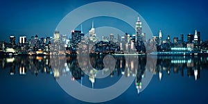 Panorama of the skyline of Manhattan viewed from Jersey city during the blue hour. New York skyline at night