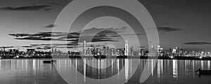 Panorama of skyline of Shenzhen city, China at dusk. Viewed from Hong Kong border Lau Fau Shan