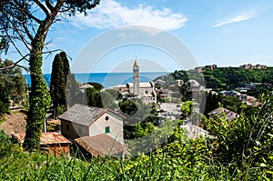 Panorama of small town Arenzano in Liguria and famous church `GesÃ¹ Bambino di Praga` in the background