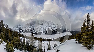 A panorama of the snow covered Peyto Lake in Banff National Park