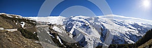 Panorama of snow mountain landscape with blue sky