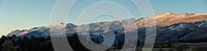 Panorama of Snow Mountain Range Landscape with Blue Sky background from New Zealand