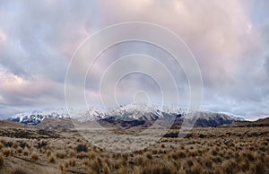 Panorama of Snow Mountain Range Landscape with Blue Sky background from New Zealand.