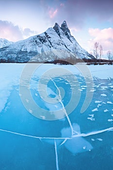 Panorama of snowy fjords and mountain range, Senja, Norway Amazing Norway nature seascape popular tourist attraction.