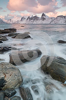 Panorama of snowy fjords and mountain range, Senja, Norway Amazing Norway nature seascape popular tourist attraction.