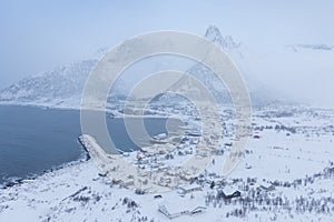 Panorama of snowy fjords and mountain range, Senja, Norway Amazing Norway nature seascape popular tourist attraction.