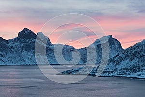 Panorama of snowy fjords and mountain range, Senja, Norway Amazing Norway nature seascape popular tourist attraction.