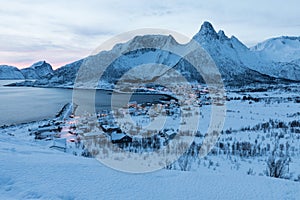 Panorama of snowy fjords and mountain range, Senja, Norway Amazing Norway nature seascape popular tourist attraction.