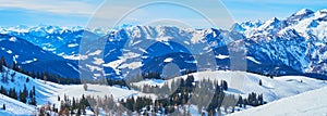 Panorama of snowy Zwieselalm Alpine meadow, Gosau, Austria