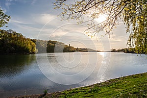 Panorama of Sotsko Jezero, or lake Sot, in Fruska Gora, in Serbia, Europe, in summer, at dusk, into the light. it is a major photo
