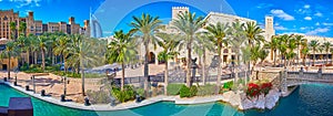 Panorama of Souk Madinat Jumeirah with canal and palm alley, Dubai, UAE