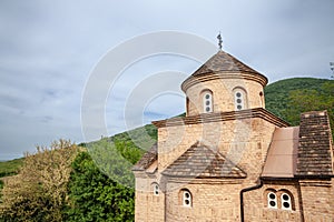 Panorama of the Srediste Monastery at dusk. Manastir Srediste a Serbian orthodox monastery of the Vrsacki Breg  mountain and park