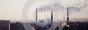 Panorama of St. Petersburg, Smolny Cathedral and smokestacks.