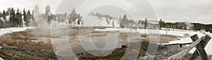 Panorama of steaming hot spring in Upper Geyser Basin, Yellowstone National Park photo