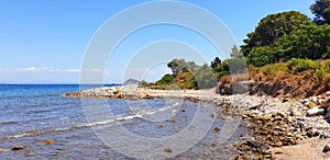 Panorama of the stone beach of the city of Cavo