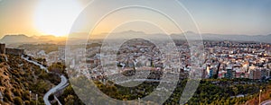 Panorama of sunset over the old city of Santa Barbara Castle, Alicante, Spain.