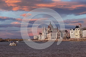 Panorama in sunset scene with building of Hungarian parliament at Danube river in Budapest city, Hungar