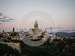 Panorama sunset view of Segovia old town historic city centre with gothic roman Cathedral Castile and Leon Spain Europe