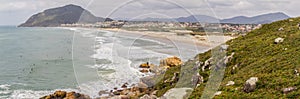 Panorama with Surfers in Costao do Santinho beach