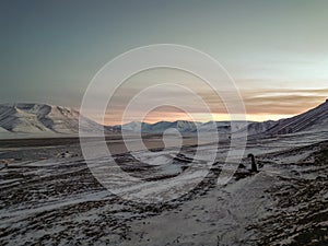 Panorama of the Svalbard mountains in the polar night noon