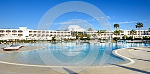 The panorama of swimming pool at luxury hotel