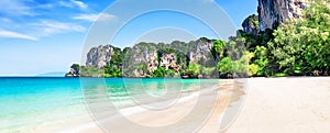 Panorama of thai traditional wooden longtail boat and beautiful sand beach