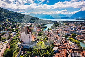 Panorama of Thun city with Alps and Thunersee lake, Switzerland. Historical Thun city and lake Thun with Bernese Highlands swiss