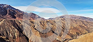 Panorama of Tizi n`Tichka mountain pass in High Atlas range, Morocco, small houses at background