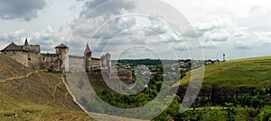 Panorama to Kamianets-Podilskyi castle and iron cross in Ukraine