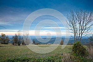 Panorama of the top and summit of Vrh Rajac moutain at dusk in autumn. Rajac is a mountain of Sumadija in Serbia, part of the