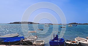 panorama of a tourist port on the sea with fishing boats under a blue sky, concept of holiday, Porto Cesario Lecce