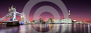 Panorama of the Tower Bridge until London Bridge with London Skyline after sunset