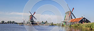 Panorama of traditional dutch windmills at the Zaan river