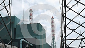 Panorama of Transmission towers and incineration plant's chimneys