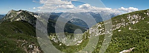 Panorama with Triglav mountain and Bohinj lake from the hillside of Crna Prst in Triglav national park in Slovenia photo