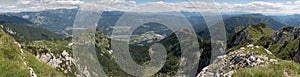 Panorama with Triglav mountain and Bohinj lake from the summit of Crna Prst in Triglav national park in Slovenia photo