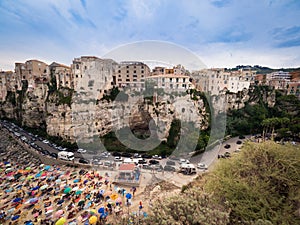 Panorama of Tropea, Italy and the crowded beach of bathers