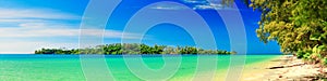 Panorama: Tropical beach with crystal clear azure sea ocean water