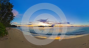 Panorama of tropical beach at sunset