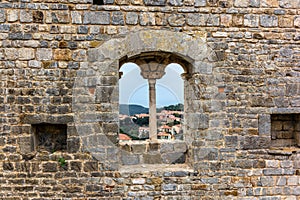 Panorama on the Tuscan hills from an old medieval windown in the