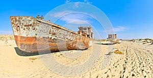 Panorama. Two old ship in the Aral desert