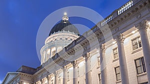 Panorama Utah State Capital Building in Salt Lake City glowing against vibrant blue sky