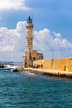 Panorama of venetian harbour waterfront and lighthouse in old harbour of Chania, Crete, Greece. Old venetian lighthouse in Chania