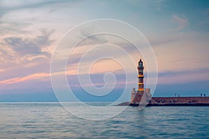 Panorama of venetian harbour waterfront and lighthouse in old harbour of Chania, Crete, Greece. Old venetian lighthouse in Chania