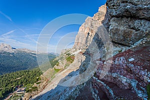 Panorama of Via Ferrata Astaldi upon Dibona mountain hut with colorful triassic rocks