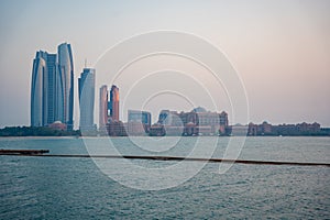 Panorama View of Abu Dhabi Skyline at sunset, United Arab Emirates