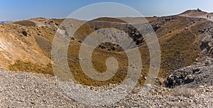 A panorama view across a crater on the volcanic island of Nea Kameni, Santorini