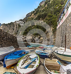 A panorama view across fishing boats on the quayside at Praiano. Italy on the Amalfi coast