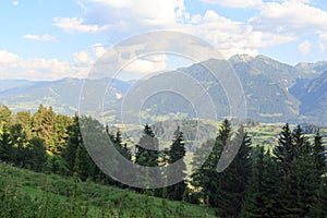 Panorama view with alpine mountains and blue sky in Salzburgerland, Austria